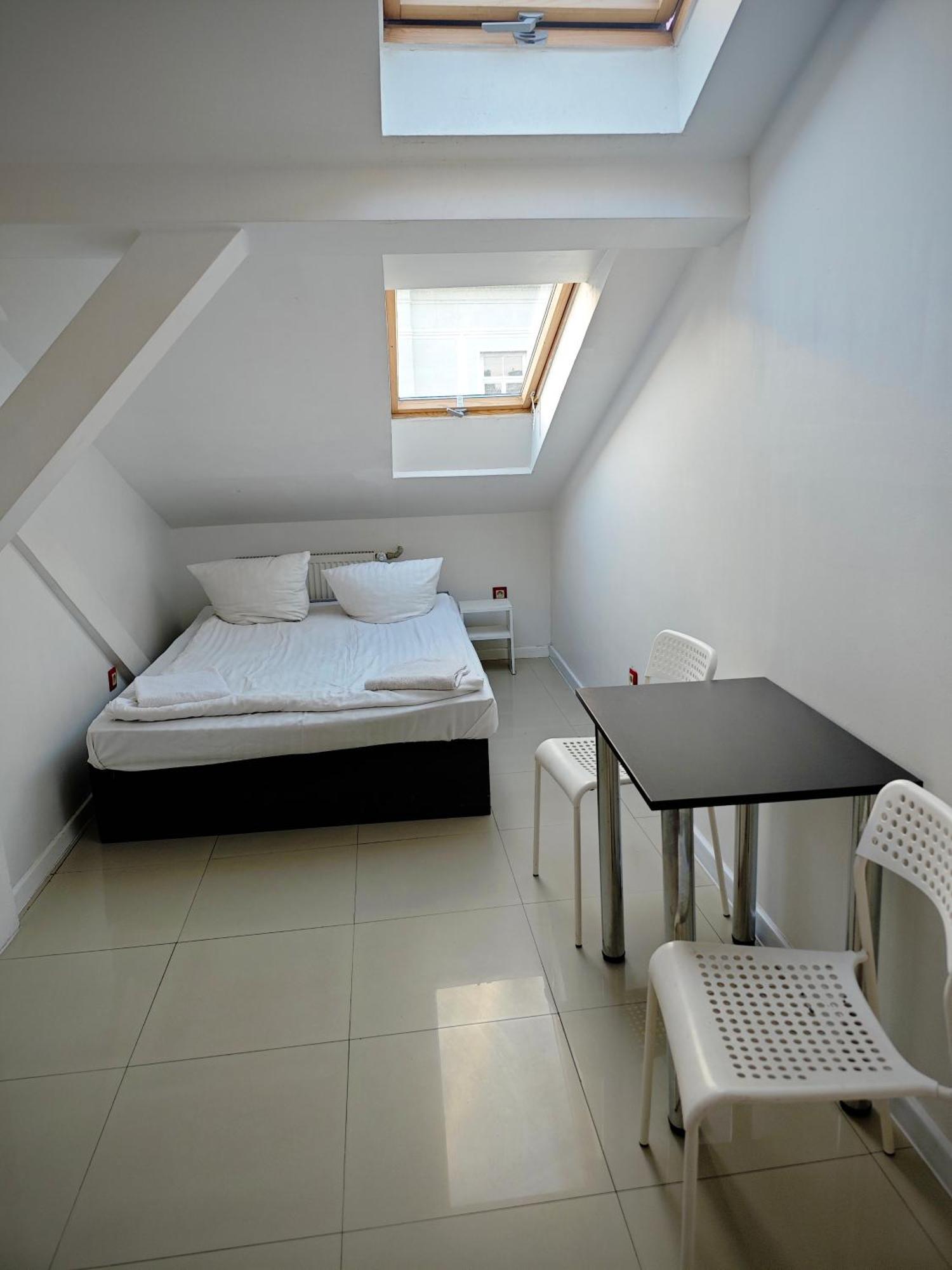 Apartamenty Hoza Attic Studio Варшава Номер фото