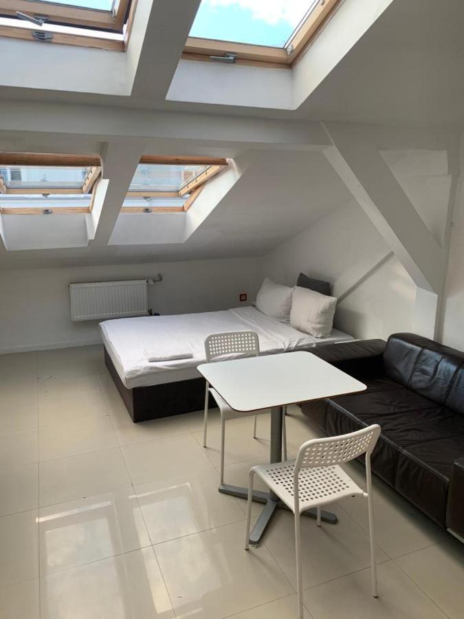 Apartamenty Hoza Attic Studio Варшава Экстерьер фото