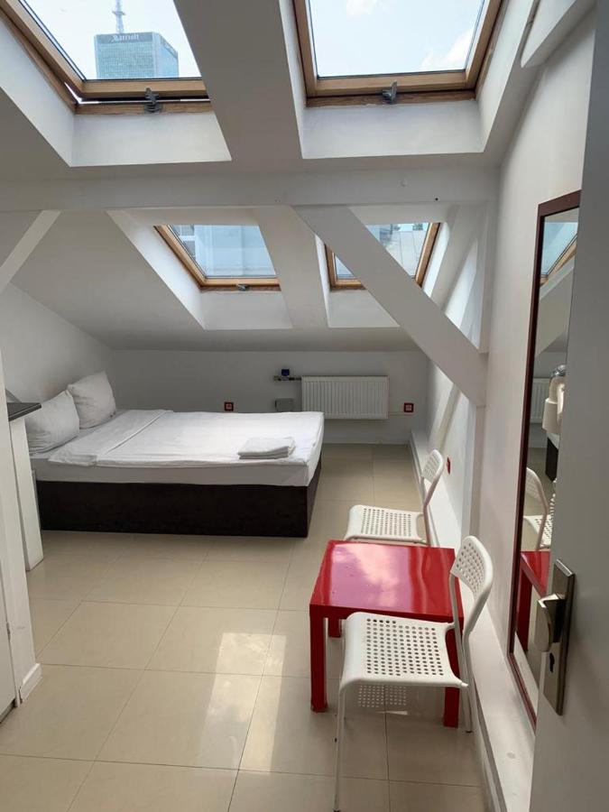 Apartamenty Hoza Attic Studio Варшава Экстерьер фото